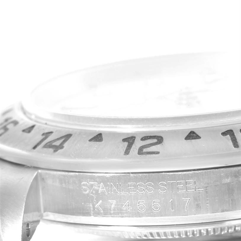 This image shows a close-up, side view of the bezel and case, featuring the serial number of a Rolex Explorer 16570 Men's Stainless Steel White Dial 16570 Men's Stainless Steel White Dial model watch.