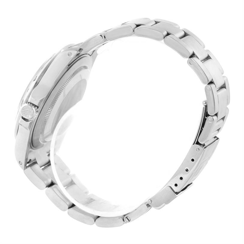 This is a side view of a Rolex Explorer 16570 Men's Stainless Steel White Dial 16570 Men's Stainless Steel White Dial watch, showing the bracelet, clasp, crown, and case back.