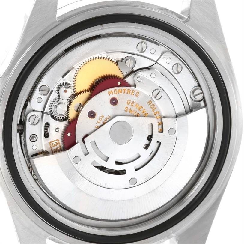 This image shows the internal mechanism of a Rolex Explorer 16570 Men's Stainless Steel White Dial 16570 Men's Stainless Steel White Dial watch, focusing on its exposed movement from the back side.