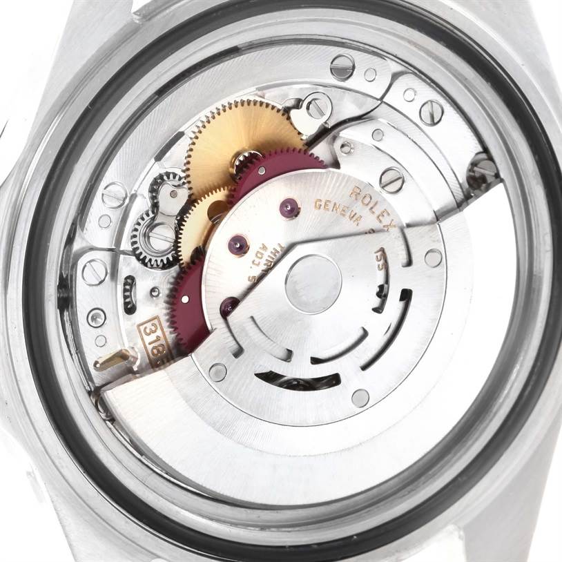 This image shows the inner movement mechanism of a Rolex Explorer 16570 Men's Stainless Steel White Dial 16570 Men's Stainless Steel White Dial watch from the back side.