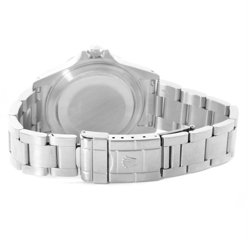 This image shows the back view of the Rolex Explorer 16570 Men's Stainless Steel White Dial 16570 Men's Stainless Steel White Dial watch and its metal bracelet with the clasp.