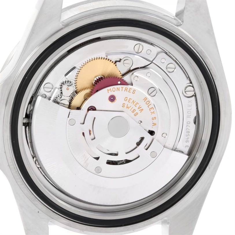 The image shows the intricate inner mechanism of the Rolex Explorer 16570 Men's Stainless Steel White Dial 16570 Men's Stainless Steel White Dial watch from a back view without its case back.