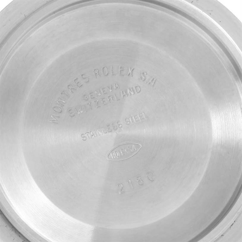 This image shows the back case of a Rolex Explorer 16570 Men's Stainless Steel White Dial 16570 Men's Stainless Steel White Dial watch, engraved with model and manufacturing details.