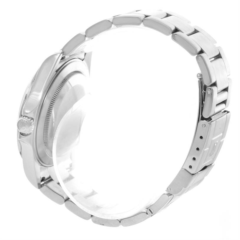 The image shows a Rolex Explorer 16570 Men's Stainless Steel White Dial 16570 Men's Stainless Steel White Dial watch from a side angle, highlighting the crown, case, and part of the bracelet.