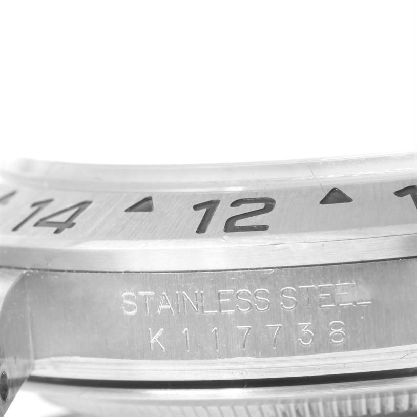 This image shows a close-up angle of the stainless steel bezel and side case of the Rolex Explorer 16570 Men's Stainless Steel Black Dial 16570 Men's Stainless Steel Black Dial watch model.