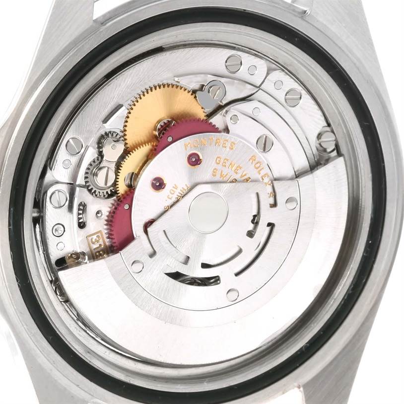 This image shows the intricate movement mechanism of the Rolex Explorer 16570 Men's Stainless Steel White Dial 16570 Men's Stainless Steel White Dial model, viewed from the back.