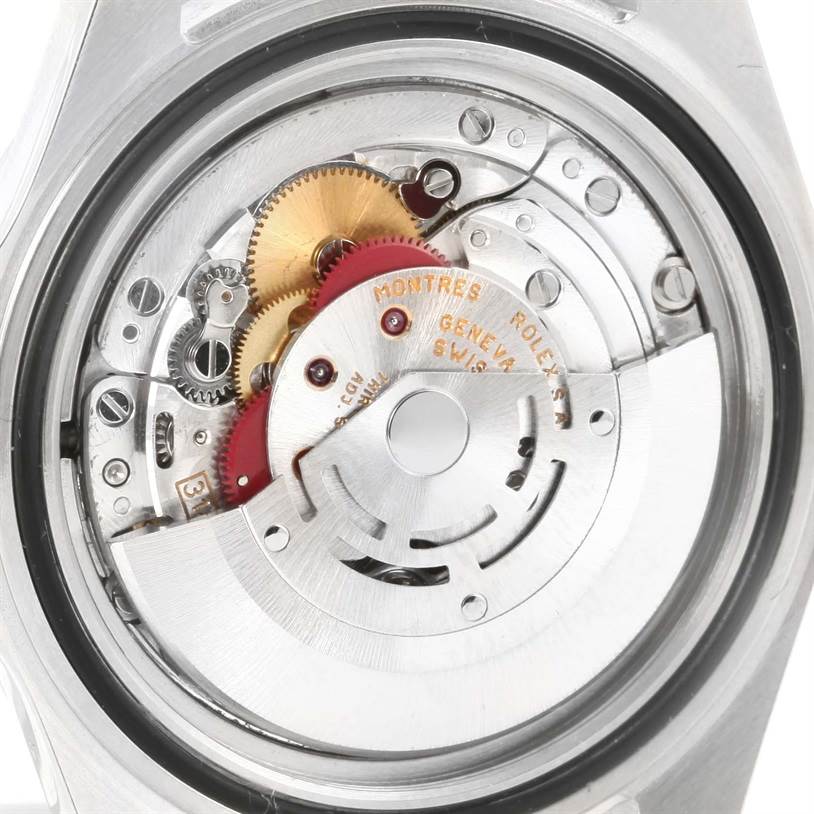 This image shows the intricate internal mechanism of a Rolex Explorer 16570 Men
s Stainless Steel White Dial 16570 Men
s Stainless Steel White Dial watch from a close-up angle.