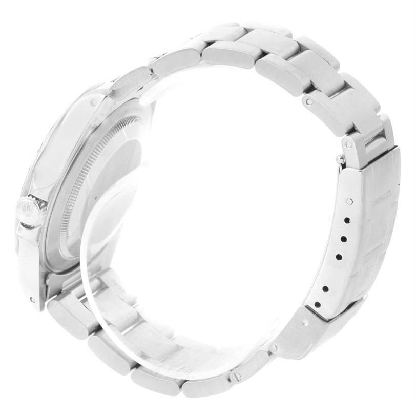 The image shows a side view of the Rolex Explorer 16570 Men
s Stainless Steel White Dial 16570 Men
s Stainless Steel White Dial watch, highlighting the bracelet, clasp, and case back.