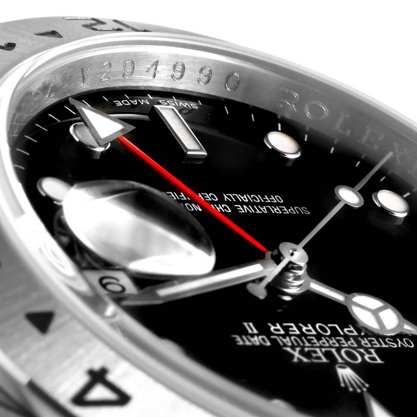 The image shows a close-up of the dial and bezel of a Rolex Explorer 16570 Men's Stainless Steel Black Dial 16570 Men's Stainless Steel Black Dial watch, highlighting the hands and engraved details.