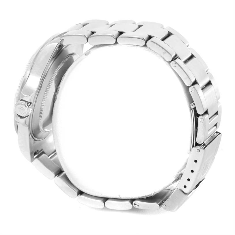 The image shows a side view of the Rolex Explorer 16570 Men's Stainless Steel White Dial 16570 Men's Stainless Steel White Dial watch, highlighting its metal bracelet and clasp.