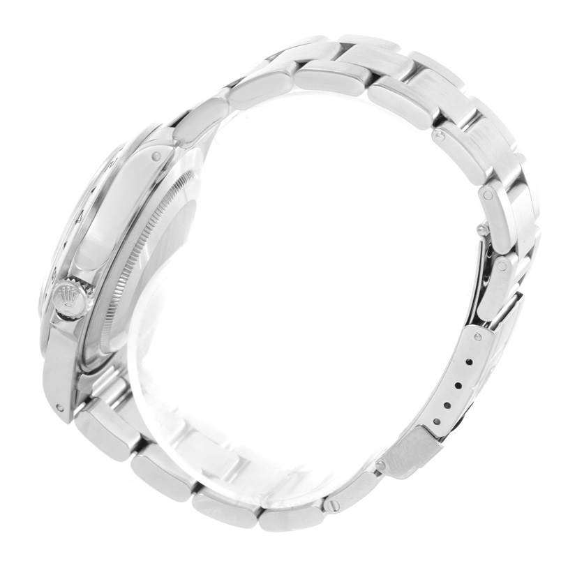 The image shows a side view of the Rolex Explorer 16570 Men's Stainless Steel White Dial 16570 Men's Stainless Steel White Dial model, highlighting the bracelet and crown.