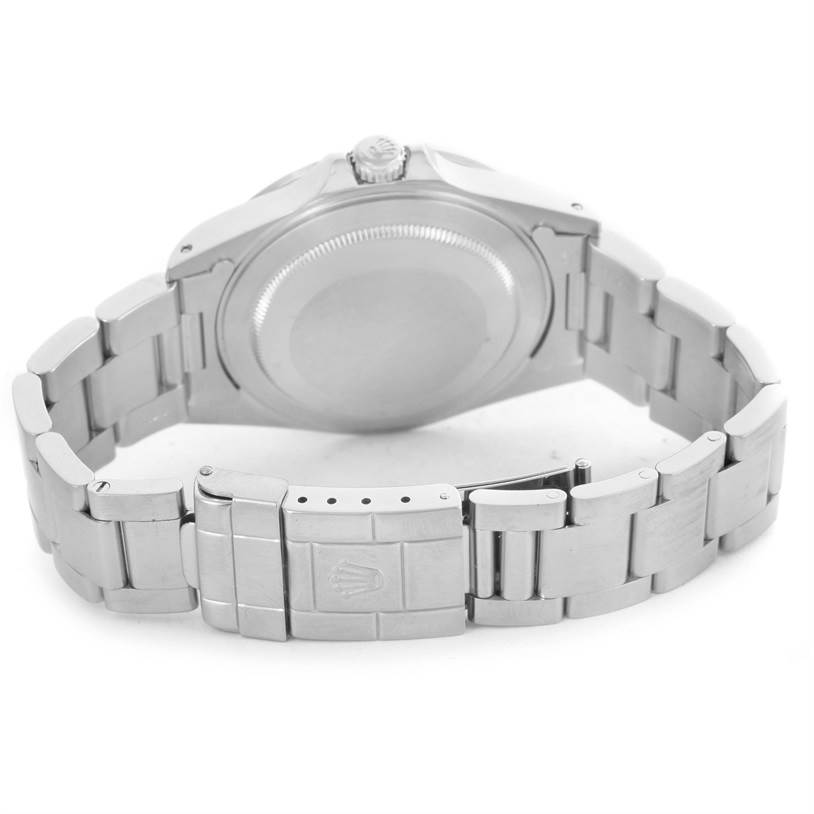 The image shows the back view of a Rolex Explorer 16570 Men's Stainless Steel White Dial 16570 Men's Stainless Steel White Dial watch, highlighting the case back and bracelet with the clasp.