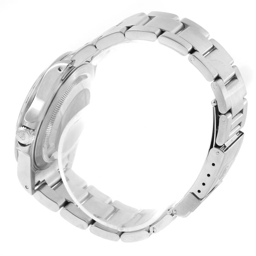 This image shows a side view of the Rolex Explorer 16570 Men's Stainless Steel White Dial 16570 Men's Stainless Steel White Dial watch, highlighting the bracelet, clasp, case, and crown.