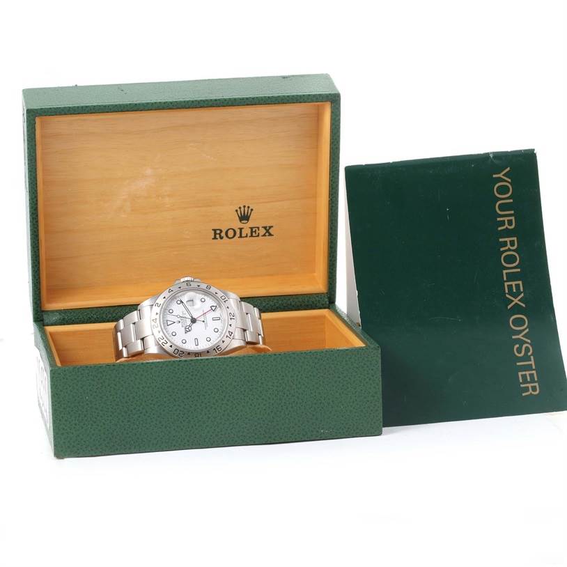 The Rolex Explorer 16570 Men's Stainless Steel White Dial 16570 Men's Stainless Steel White Dial watch is shown in its open box with the lid propped up, displaying the dial and bracelet.