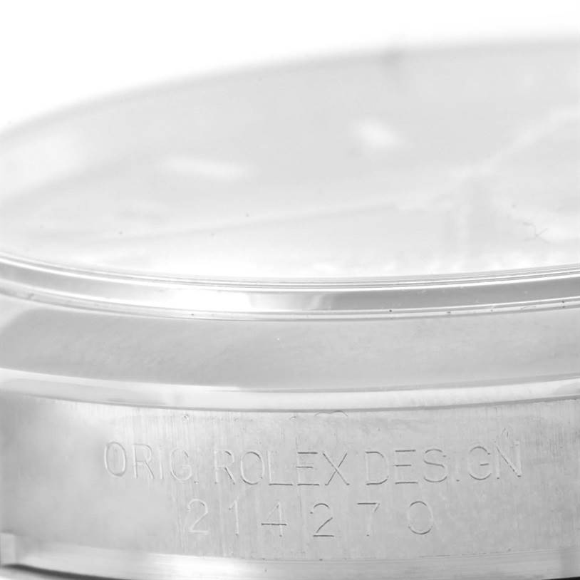 The image shows a close-up of the case side and bezel of a Rolex Explorer 214270 Men's Stainless Steel Black Dial 214270 Men's Stainless Steel Black Dial watch, highlighting the engraved model number.