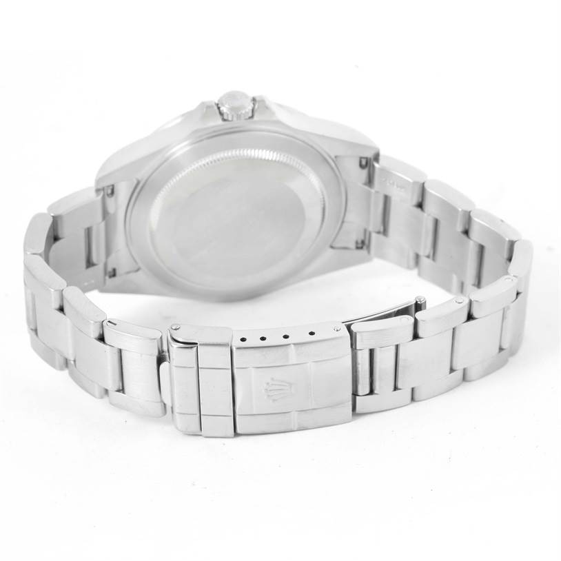 The image shows the back view of a Rolex Explorer 16570 Men's Stainless Steel White Dial 16570 Men's Stainless Steel White Dial watch, highlighting its case and metal bracelet clasp.