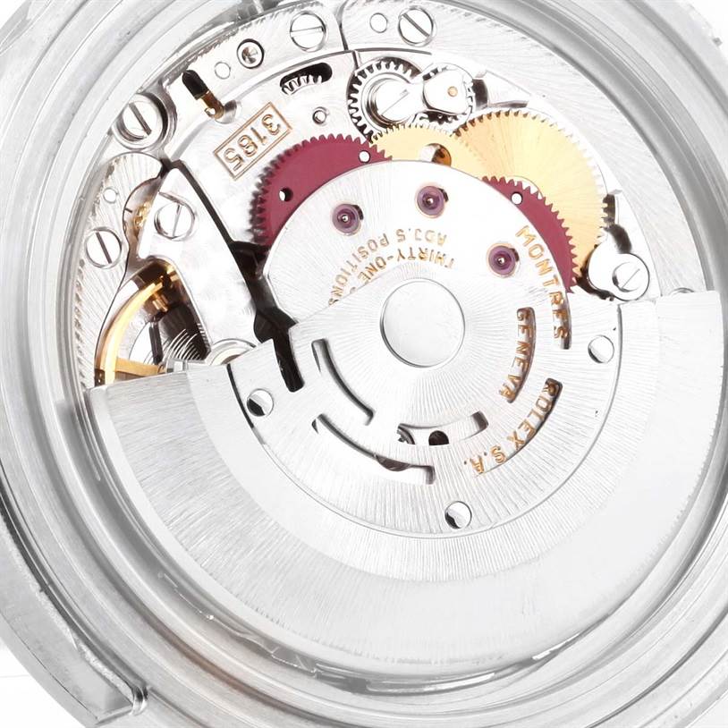 This image shows the intricate internal mechanism and gears of a Rolex Explorer 16570 Men's Stainless Steel White Dial 16570 Men's Stainless Steel White Dial watch from a rear angle.