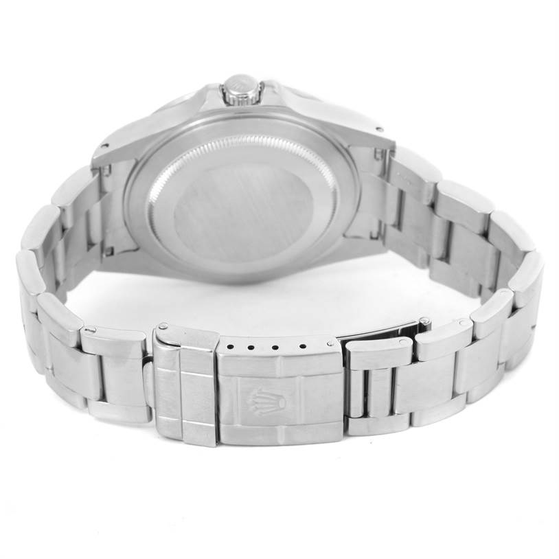 The image shows the back view of a Rolex Explorer 16570 Men's Stainless Steel White Dial 16570 Men's Stainless Steel White Dial watch, highlighting the case back and stainless steel bracelet.