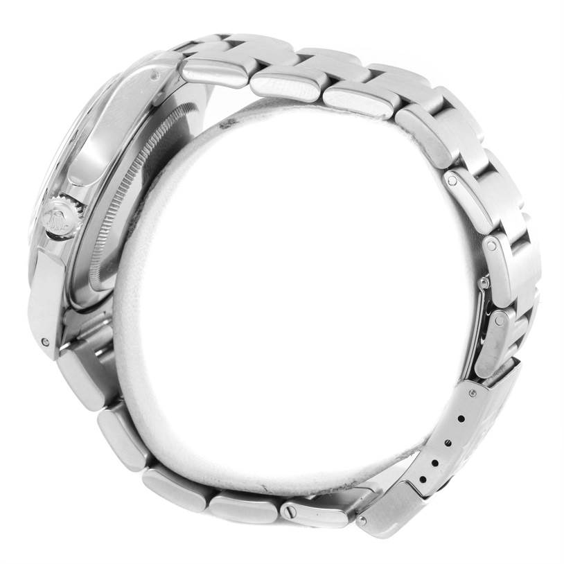 This image shows the side profile of a Rolex Explorer 16570 Men's Stainless Steel White Dial 16570 Men's Stainless Steel White Dial watch, highlighting the crown, case, and part of the bracelet.