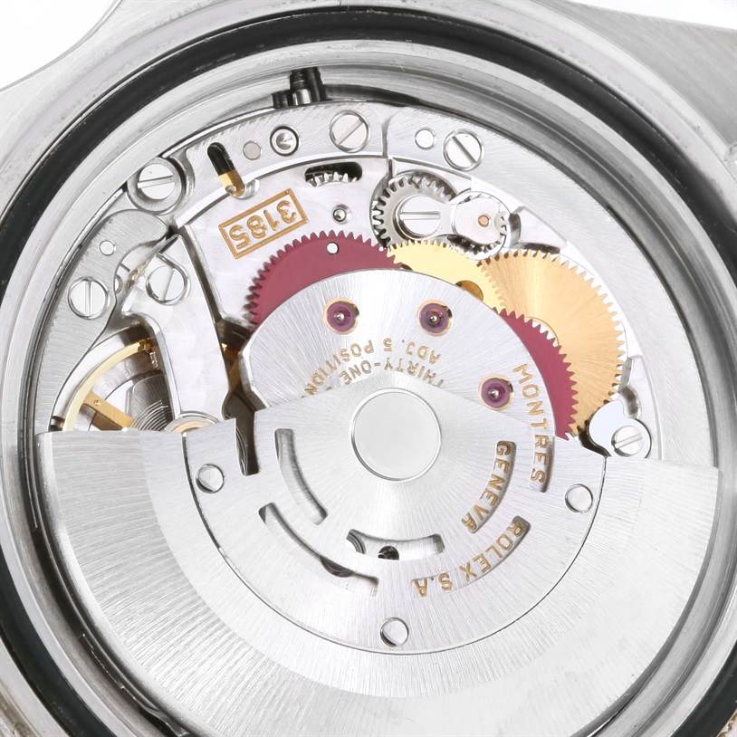 This image shows the movement and internal mechanics of a Rolex Explorer 16570 Men's Stainless Steel White Dial 16570 Men's Stainless Steel White Dial watch from a close-up angle.