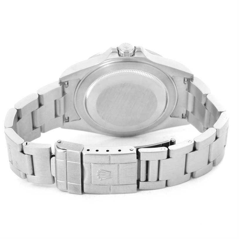 The image shows a Rolex Explorer 16570 Men's Stainless Steel White Dial 16570 Men's Stainless Steel White Dial watch from the back, highlighting the case back and the metal bracelet clasp.