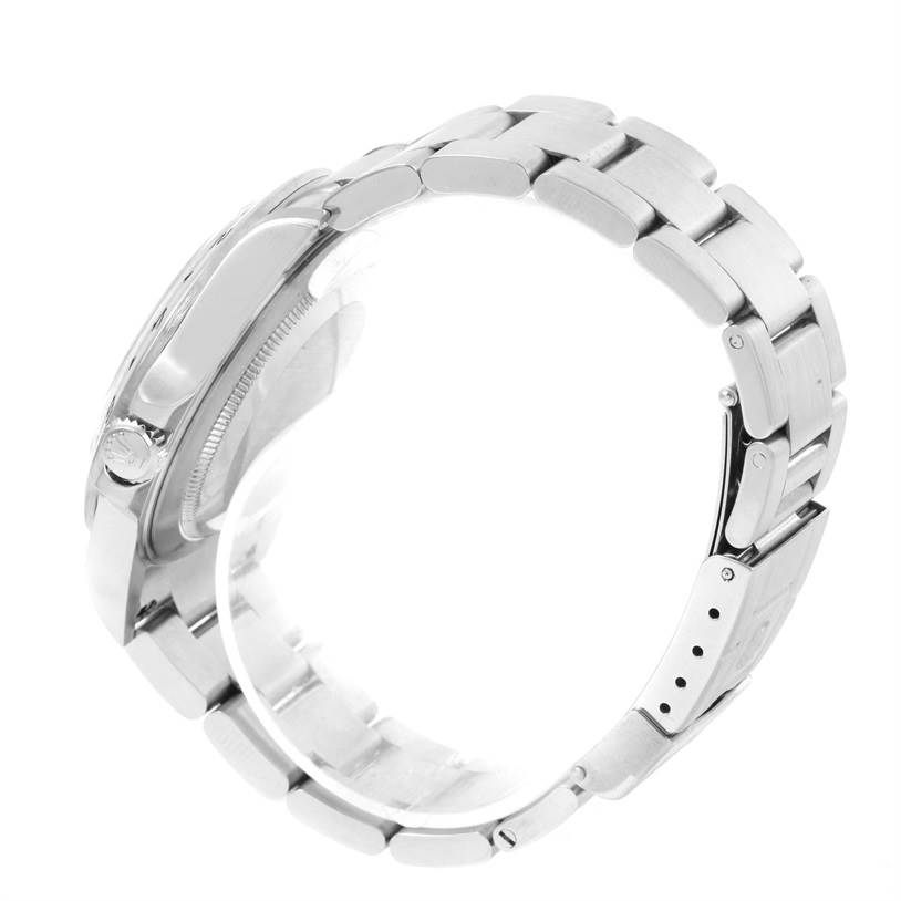 The image shows a side view of a Rolex Explorer 16570 Men's Stainless Steel White Dial 16570 Men's Stainless Steel White Dial watch, highlighting the crown, case, and stainless steel bracelet.