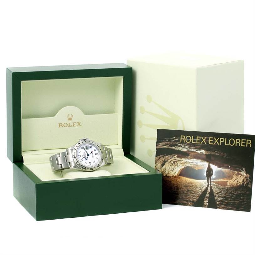 The image shows a Rolex Explorer 16570 Men's Stainless Steel White Dial 16570 Men's Stainless Steel White Dial watch in its original box with the lid open and a brochure beside it.