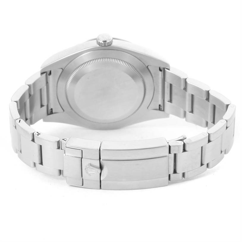 The image shows the back view of a Rolex Explorer 214270 Men's Stainless Steel Black Dial 214270 Men's Stainless Steel Black Dial watch, highlighting its case back, crown, and metal bracelet with clasp.