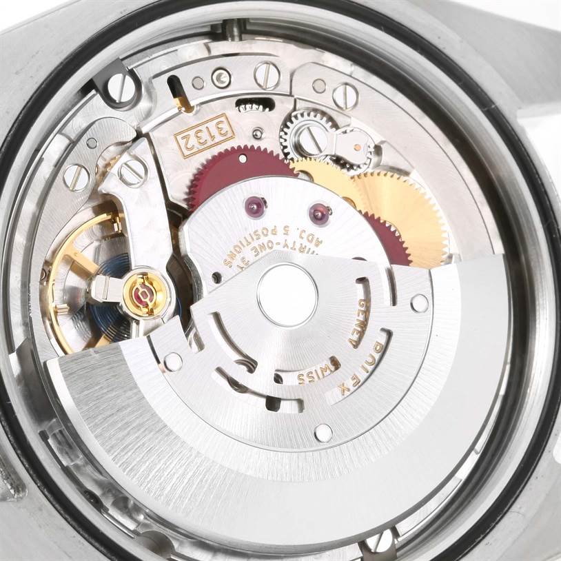 This image displays the internal mechanics of a Rolex Explorer 214270 Men's Stainless Steel Black Dial 214270 Men's Stainless Steel Black Dial watch, focusing on the movement and components.