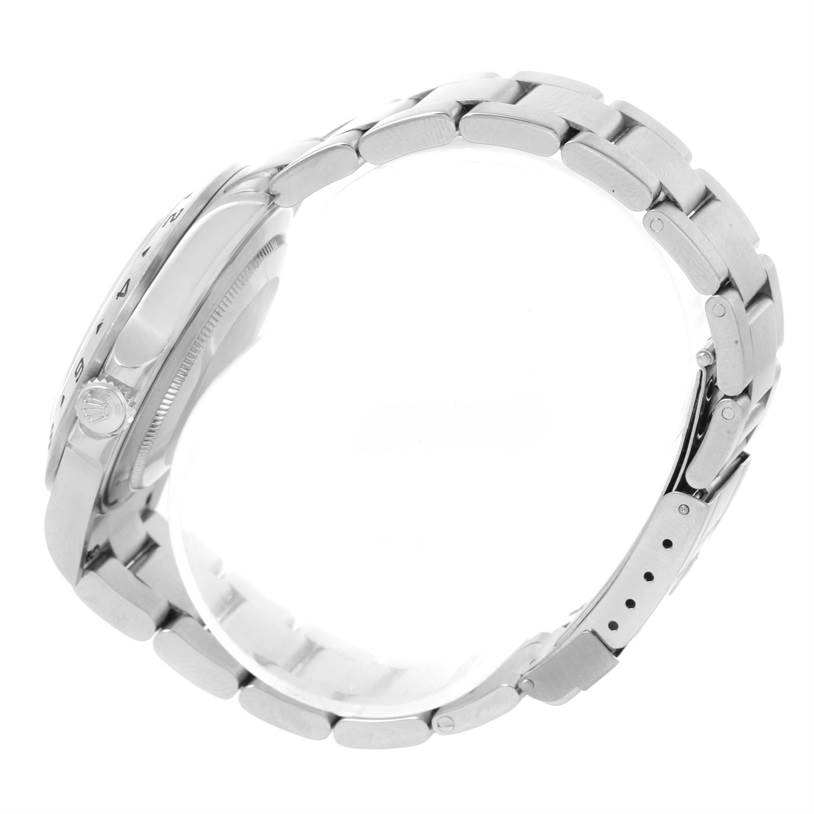 The image shows a side view of the Rolex Explorer 16570 Men's Stainless Steel White Dial 16570 Men's Stainless Steel White Dial model, highlighting its bracelet and crown.