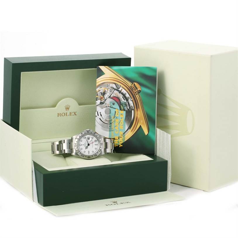 The image shows a Rolex Explorer 16570 Men's Stainless Steel White Dial 16570 Men's Stainless Steel White Dial watch with its stainless-steel band, presented in its box with documentation.