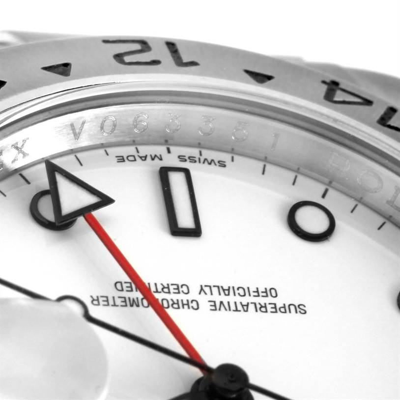 The image shows a close-up of the dial and bezel of the Rolex Explorer 16570 Men's Stainless Steel White Dial 16570 Men's Stainless Steel White Dial watch model, focusing on the hands and indices.