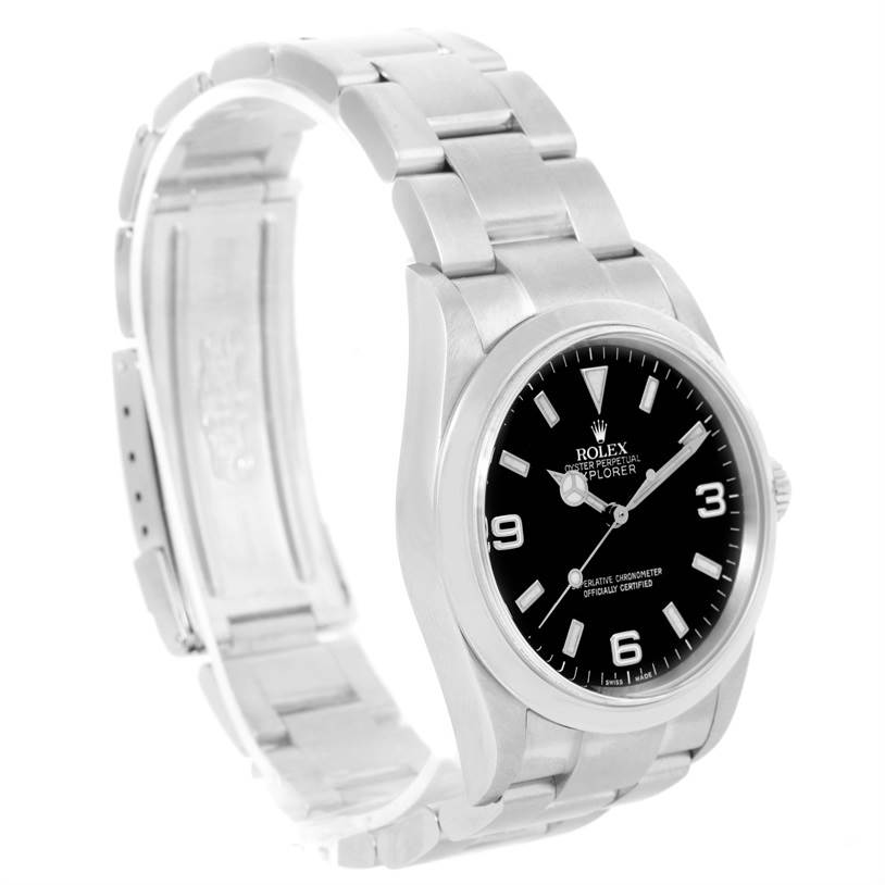 The Rolex Explorer 114270 Men's Stainless Steel Black Dial 114270 Men's Stainless Steel Black Dial watch is shown at a three-quarter angle, highlighting the face, bracelet, and clasp.