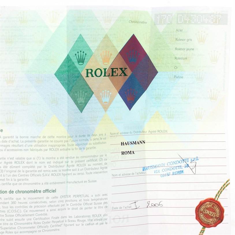 This image shows the warranty certificate for a Rolex Explorer 114270 Men's Stainless Steel Black Dial 114270 Men's Stainless Steel Black Dial watch, including the Rolex logo and authorized dealer details.