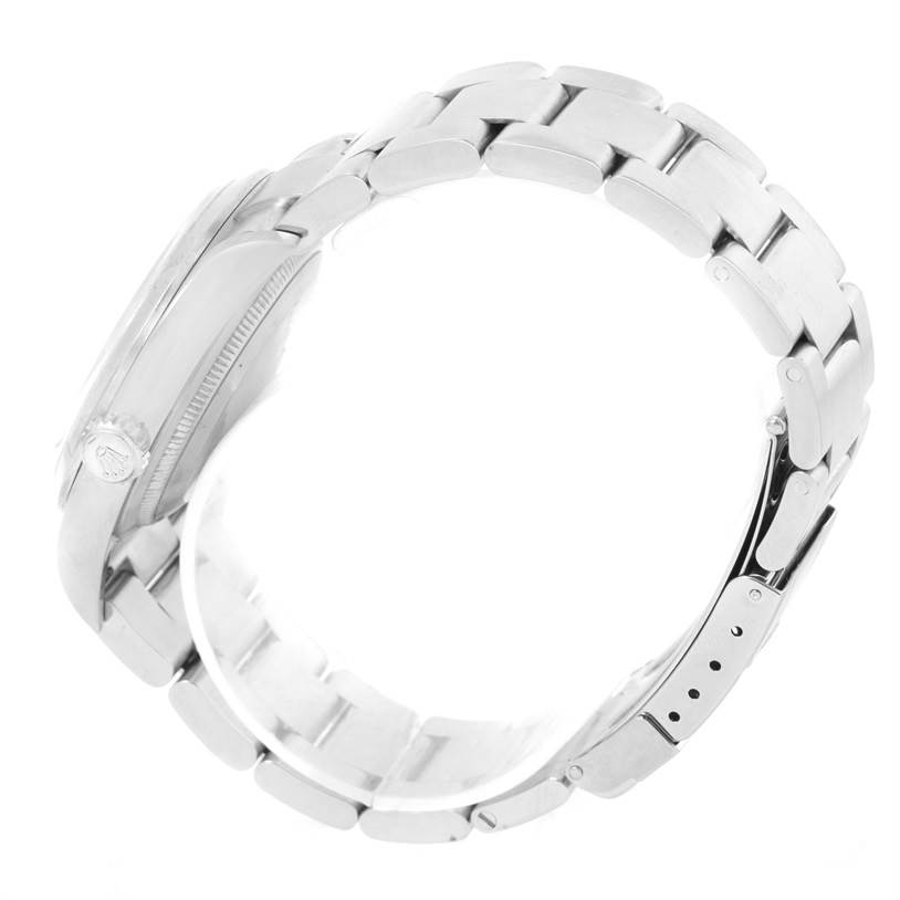 The image shows a side view of a Rolex Explorer 114270 Men's Stainless Steel Black Dial 114270 Men's Stainless Steel Black Dial watch, focusing on the bracelet and crown.