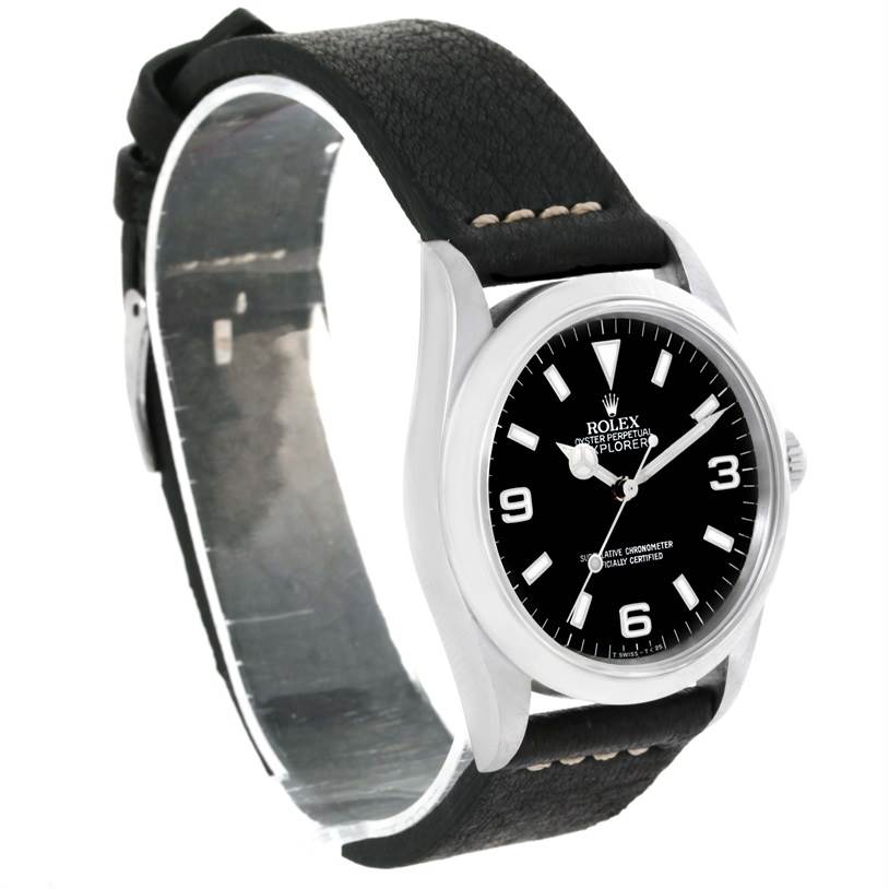 The Rolex Explorer 14270 Men's Stainless Steel Black Dial 14270 Men's Stainless Steel Black Dial watch is shown at a side angle, displaying its face, case, and black leather strap.