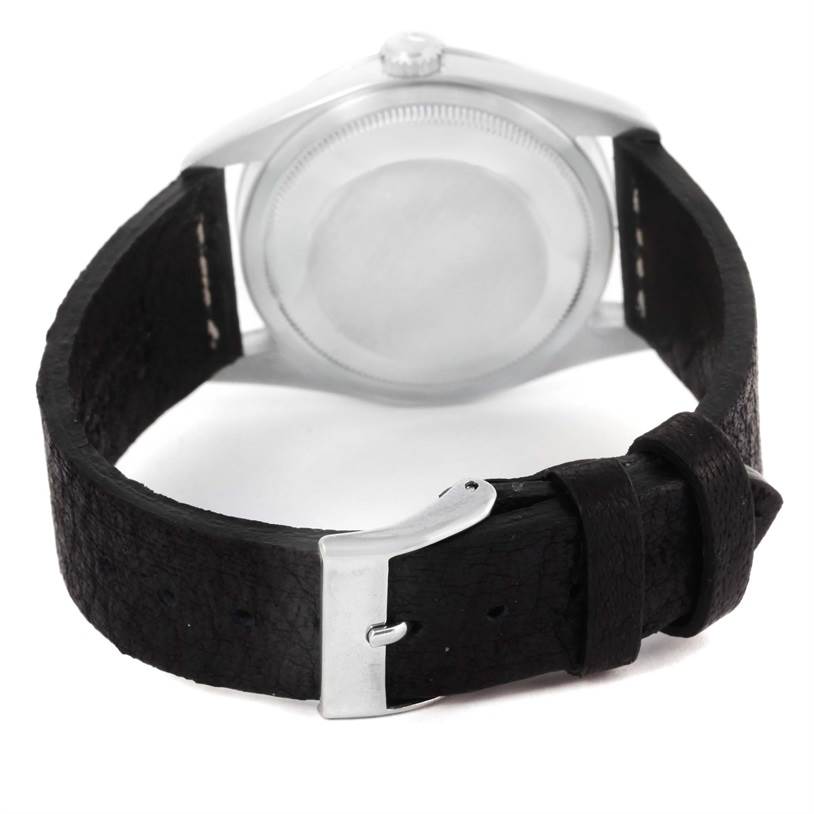 The image shows the back of the Rolex Explorer 14270 Men's Stainless Steel Black Dial 14270 Men's Stainless Steel Black Dial watch, highlighting the case back and the black leather strap with its buckle.