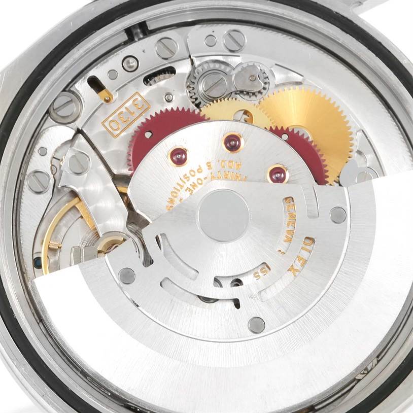 The image shows the internal mechanism and movement parts of a Rolex Explorer 114270 Men
s Stainless Steel Black Dial 114270 Men
s Stainless Steel Black Dial watch, viewed from the back.