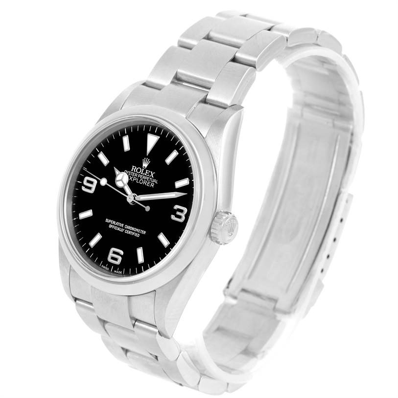 The image shows a Rolex Explorer 114270 Men
s Stainless Steel Black Dial 114270 Men
s Stainless Steel Black Dial watch at a three-quarter angle, highlighting its black dial, crown, and stainless steel bracelet.