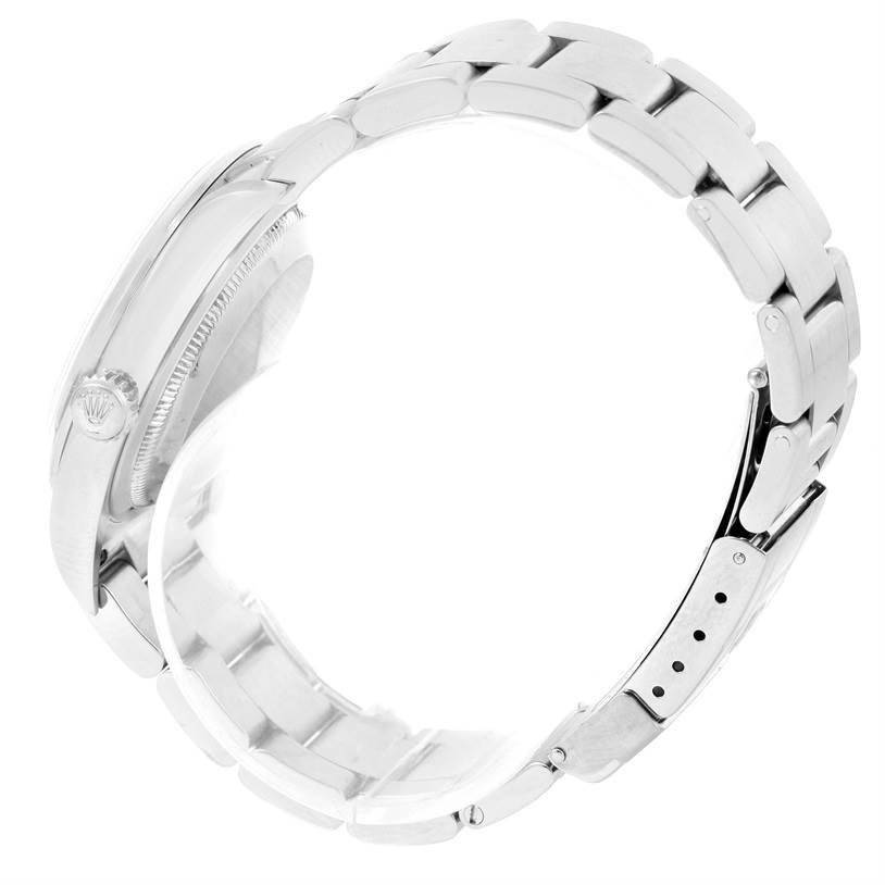 The image shows a side view of the Rolex Explorer 114270 Men
s Stainless Steel Black Dial 114270 Men
s Stainless Steel Black Dial watch, highlighting its crown, case, and metal bracelet.