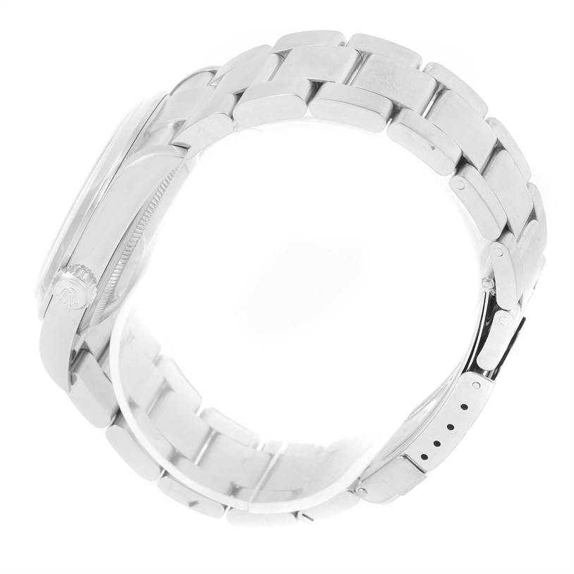 The image shows a Rolex Explorer 114270 Men's Stainless Steel Black Dial 114270 Men's Stainless Steel Black Dial watch from a side angle, highlighting its bracelet, clasp, and partially visible crown.