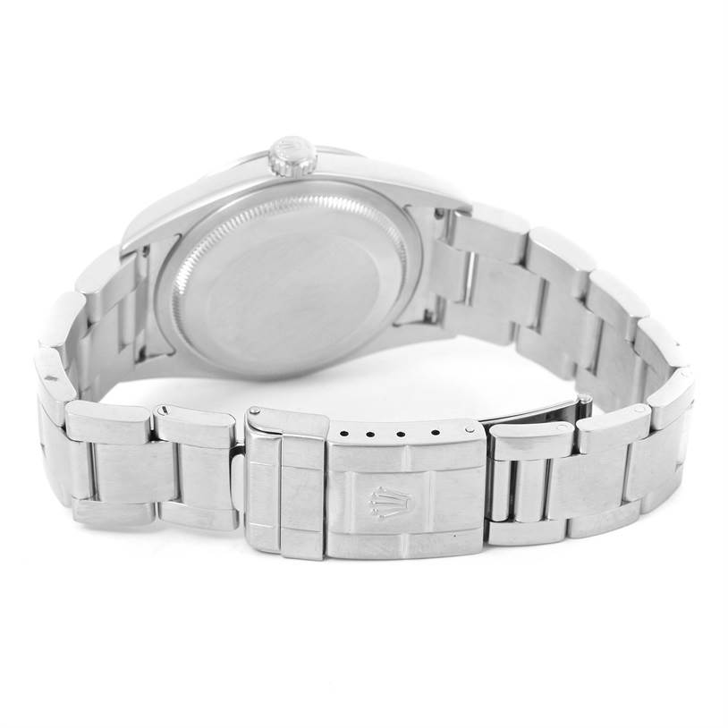 The image shows the back with the clasp and bracelet of a Rolex Explorer 114270 Men's Stainless Steel Black Dial 114270 Men's Stainless Steel Black Dial model watch.