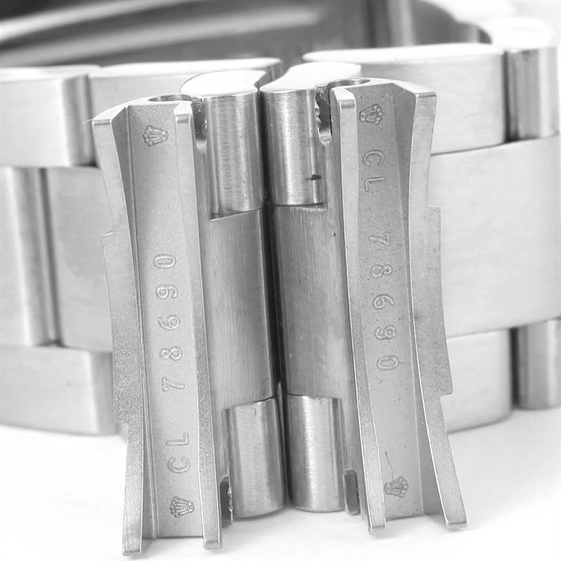 This image shows a close-up of the band clasp of a Rolex Explorer 114270 Men's Stainless Steel Black Dial 114270 Men's Stainless Steel Black Dial watch, highlighting the bracelet links and Rolex engravings.