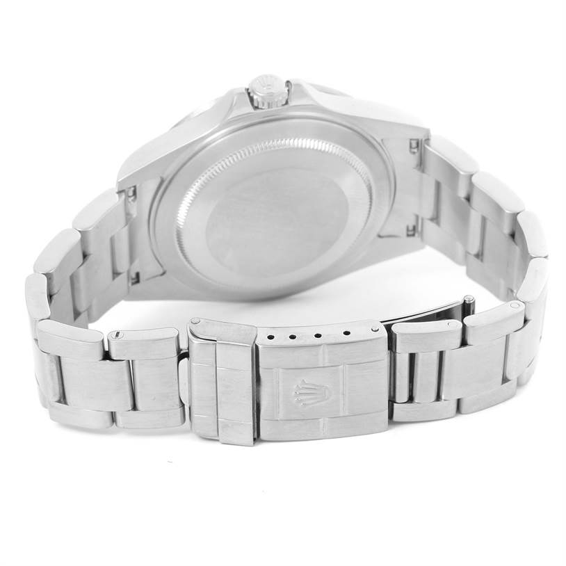 This image shows the back of the Rolex Explorer 16570 Men's Stainless Steel White Dial 16570 Men's Stainless Steel White Dial watch, featuring the case back and partially open bracelet with clasp.