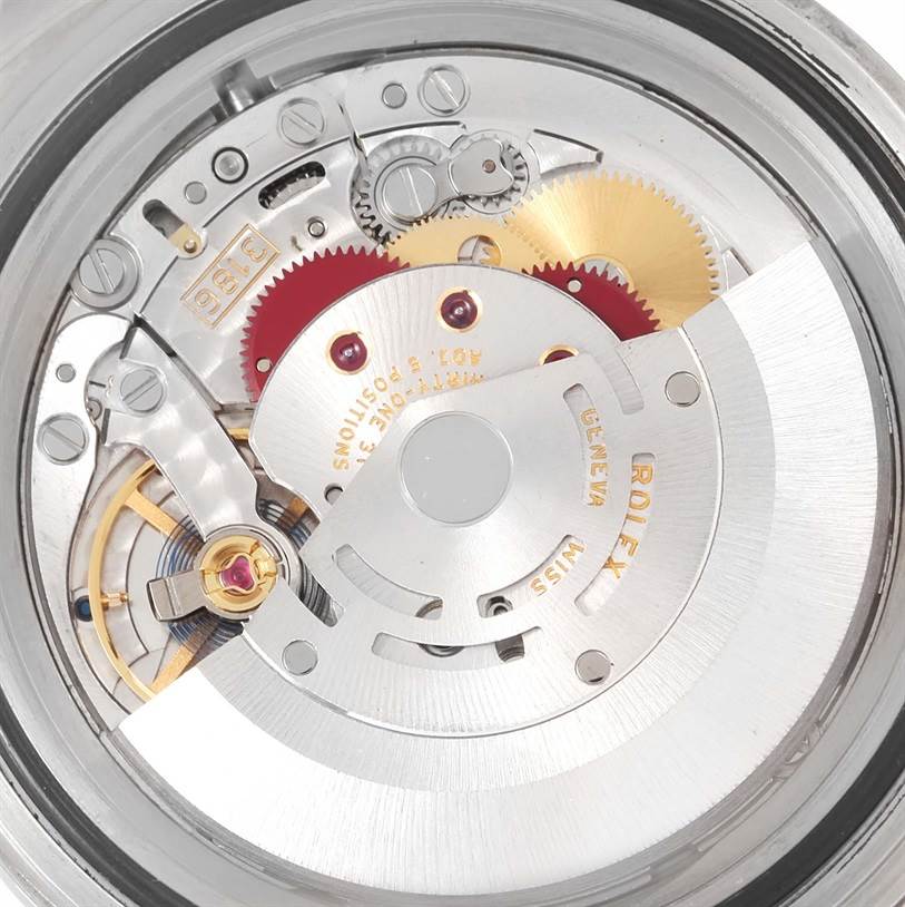 This is the internal mechanism of the Rolex Explorer 16570 Men's Stainless Steel White Dial 16570 Men's Stainless Steel White Dial watch, showing gears, balance wheel, and movement parts from a top-down angle.
