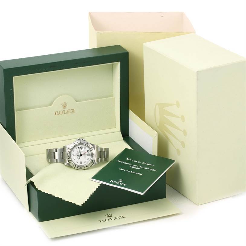The image shows a Rolex Explorer 16570 Men's Stainless Steel White Dial 16570 Men's Stainless Steel White Dial watch in its open box with packaging and manuals included.