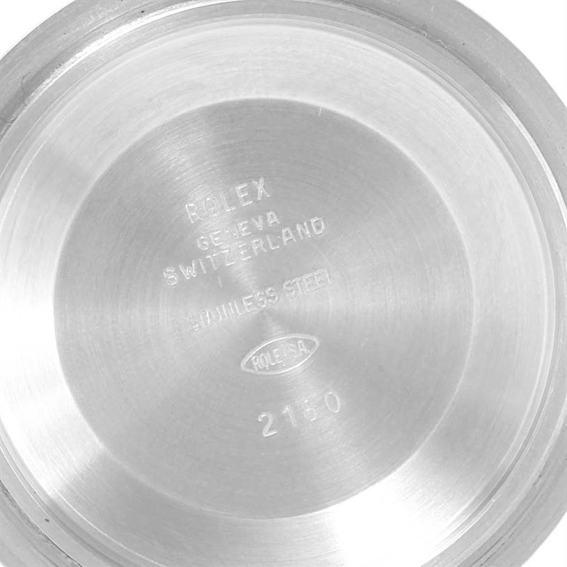 The image shows the inside case back of a Rolex Explorer 16570 Men's Stainless Steel White Dial 16570 Men's Stainless Steel White Dial watch, revealing engraving details.