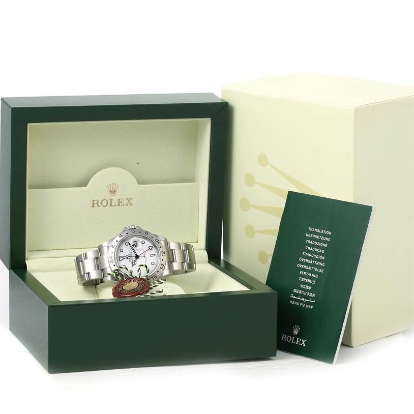 The image shows a Rolex Explorer 16570 Men's Stainless Steel White Dial 16570 Men's Stainless Steel White Dial watch, its box, and accompanying documentation from a front angle.