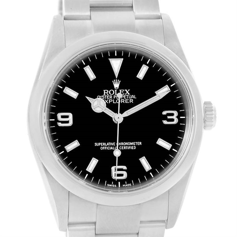 The image shows a front view of a Rolex Explorer watch, highlighting the dial, hour markers, hands, and bracelet.