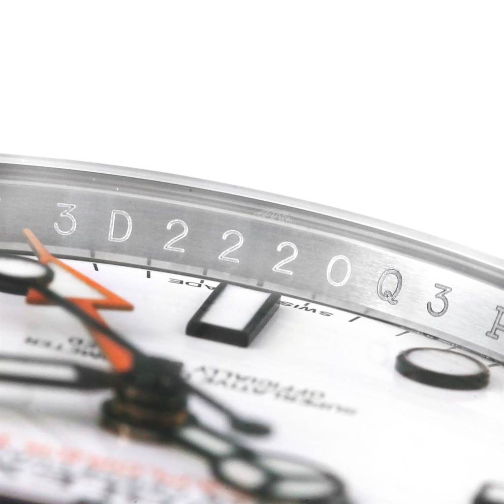 This is a close-up angle of the dial and part of the bezel of a Rolex Explorer 216570 Men
s Stainless Steel White Dial 216570 Men
s Stainless Steel White Dial watch.